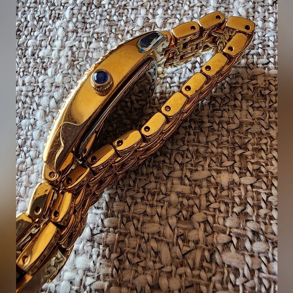 Vintage Nolan Miller crystal gold-tone watch.
